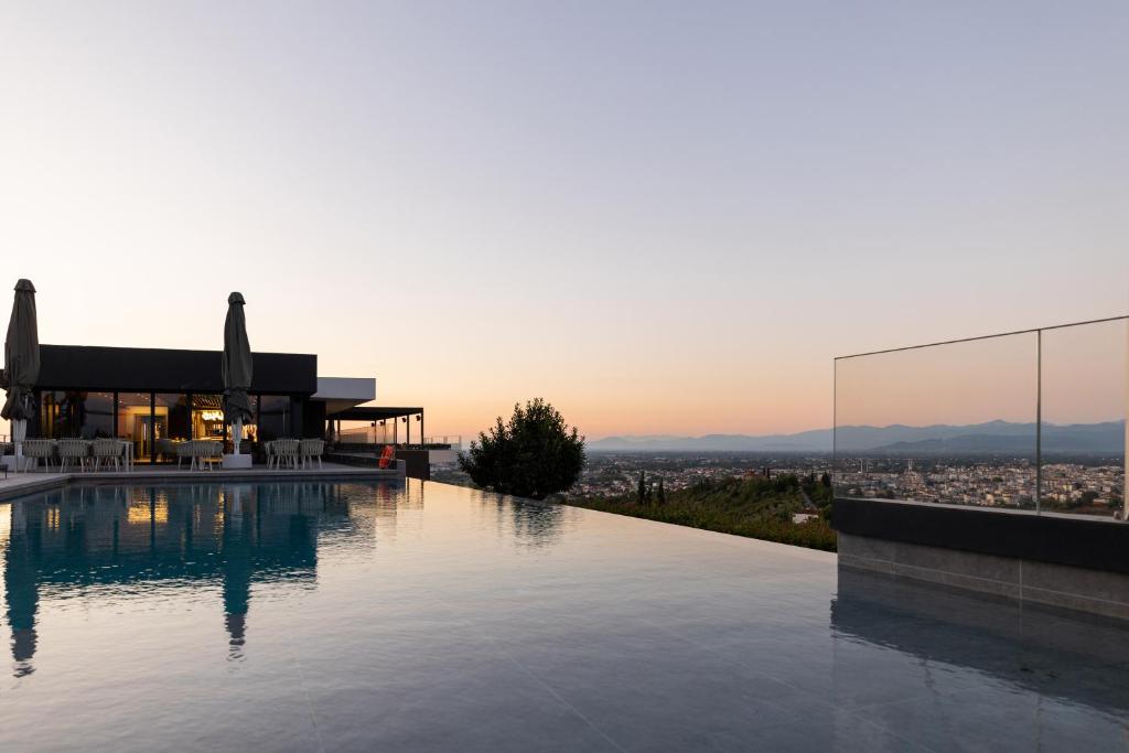 outdoor pool - ananti resort & spa trikala