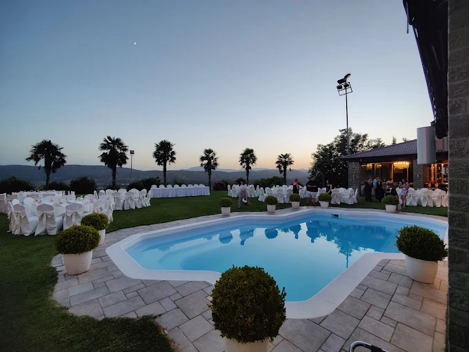 outdoor pool and garden area - xitos luxury hall ioannina